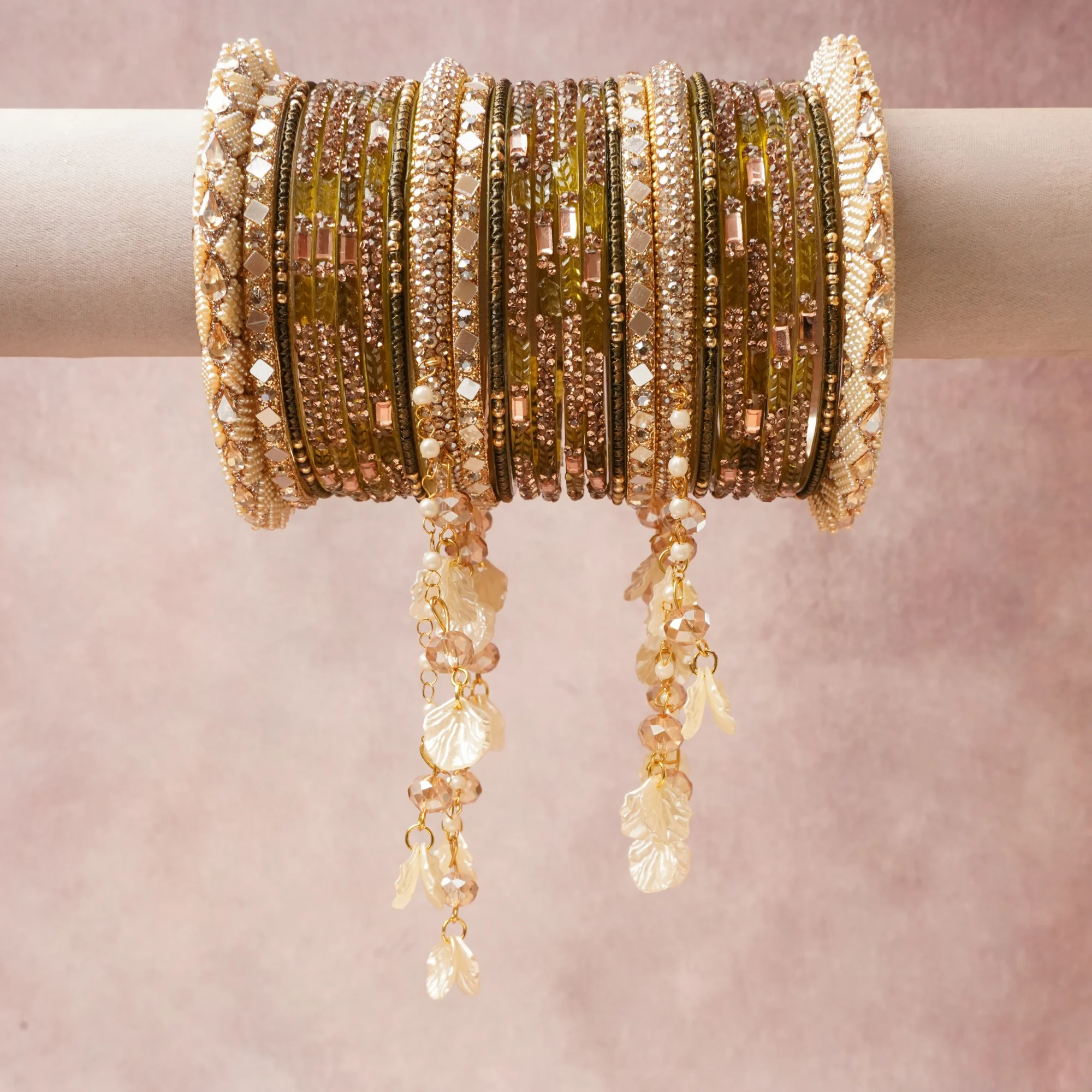 A commanding Olive Green anchors this beautiful set, enriched with accents of Clear Crystal, Rose Pink, Cream, Champagne that add depth and dimension.

Featuring a striking composition of Gold-toned Metal, Glass Crystals, Glass Mirrors, Imitation Pearls, Faceted Glass Beads, Enamel, Mother-of-Pearl, this set carries intricate craftsmanship and strong presence. Grand in form, it is created for moments that deserve to be marked.